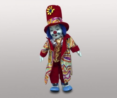 Клоун кукла в красной шляпе
