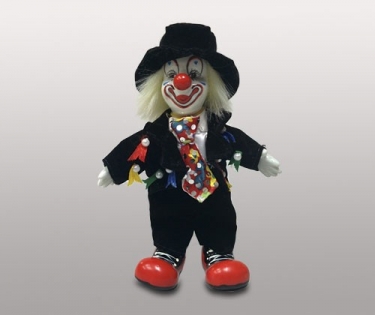 Кукла клоун в черной шляпе