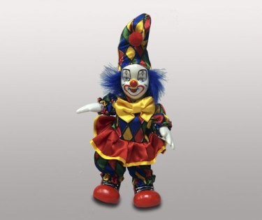 Клоун кукла в разноцветном колпаке с помпоном